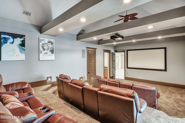 home theater room featuring carpet floors and ceiling fan