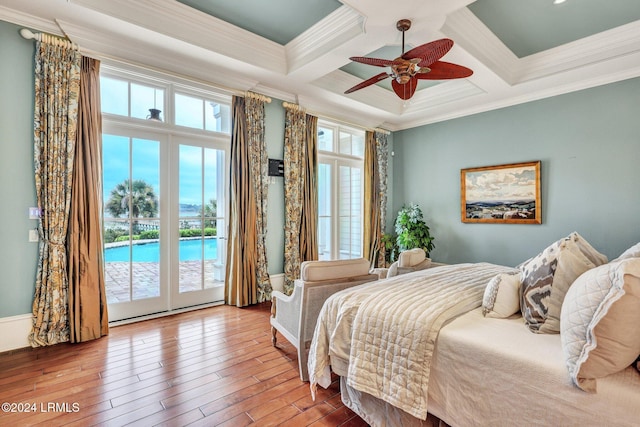 bedroom with crown molding, ceiling fan, coffered ceiling, and access to exterior