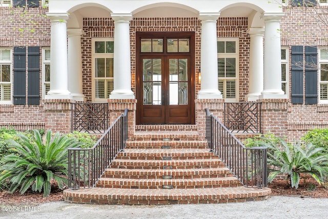 entrance to property featuring french doors