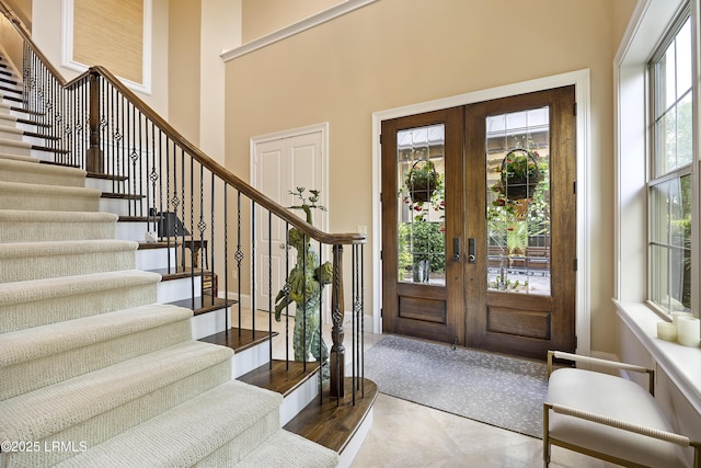 13 Mooring Line Ct Unit 1463, Bluffton, SC 29910 - tiled foyer featuring french doors, a towering ceiling, and stairs