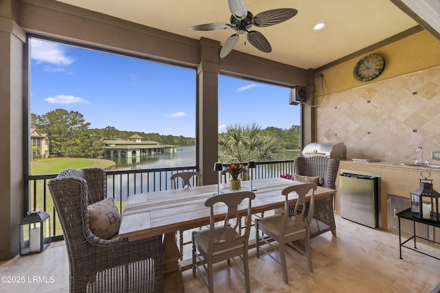 13 Mooring Line Ct Unit 1463, Bluffton, SC 29910 - sunroom with a sink, recessed lighting, and a water view