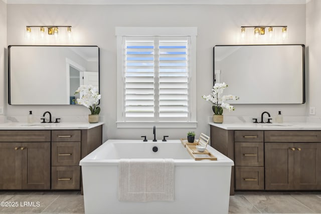 782 Azalea Dr, Hardeeville, SC 29927 - full bath featuring a soaking tub, two vanities, and tile patterned floors