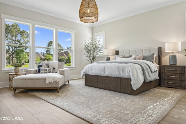 782 Azalea Dr, Hardeeville, SC 29927 - bedroom featuring baseboards, ornamental molding, and wood finished floors