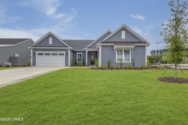 782 Azalea Dr, Hardeeville, SC 29927 - view of front of home featuring driveway, a front yard, and a garage