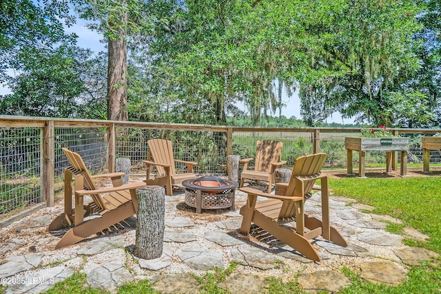 70 Dolphin Point Dr, Beaufort, SC 29907 - view of patio with a fire pit