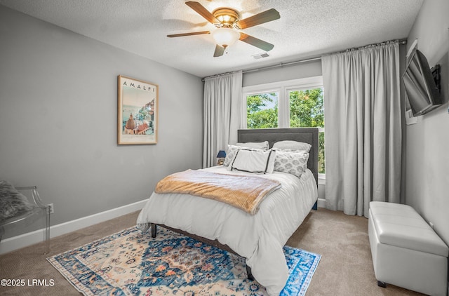 70 Dolphin Point Dr, Beaufort, SC 29907 - bedroom with a textured ceiling, carpet flooring, and a ceiling fan