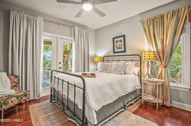70 Dolphin Point Dr, Beaufort, SC 29907 - bedroom featuring wood finished floors, multiple windows, a ceiling fan, and french doors