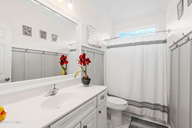 170 Pinecrest Cir, Bluffton, SC 29910 - full bath featuring ornamental molding, toilet, vanity, a decorative wall, and wainscoting