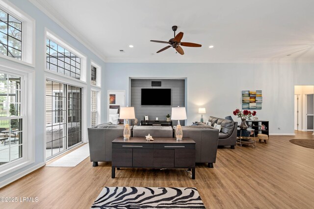 170 Pinecrest Cir, Bluffton, SC 29910 - living area featuring wood finished floors, ornamental molding, ceiling fan, recessed lighting, and baseboards