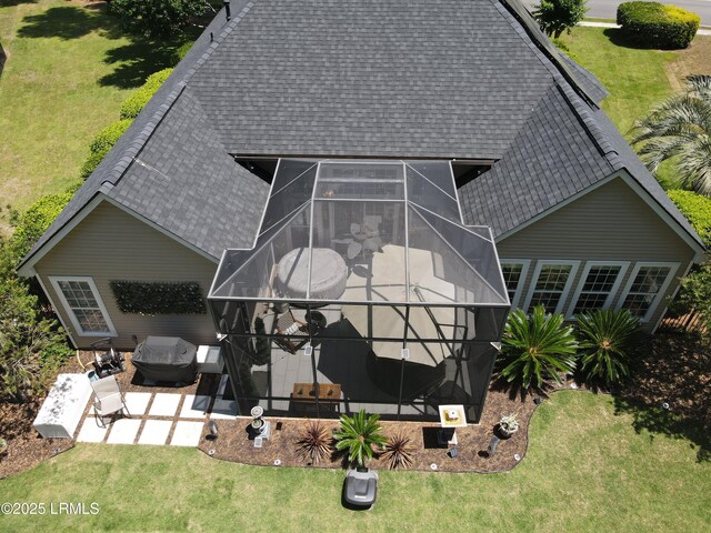 170 Pinecrest Cir, Bluffton, SC 29910 - back of property featuring roof with shingles, a patio area, a lanai, and a yard