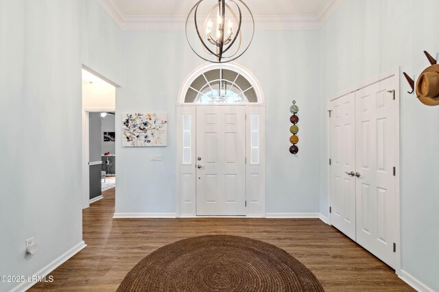 170 Pinecrest Cir, Bluffton, SC 29910 - entrance foyer featuring a chandelier, ornamental molding, wood finished floors, baseboards, and a towering ceiling