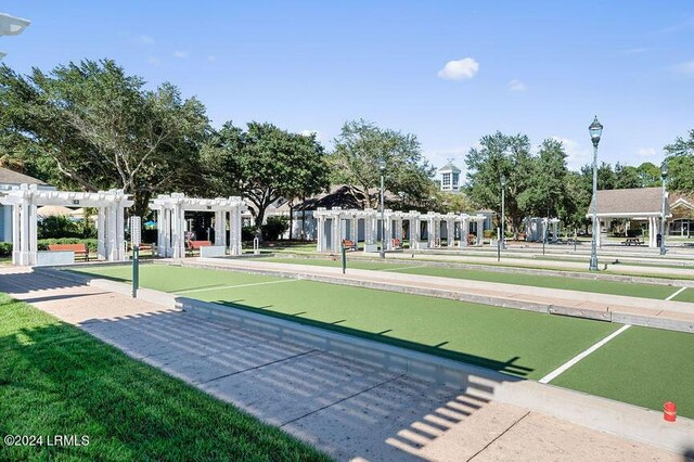 view of home's community featuring a pergola