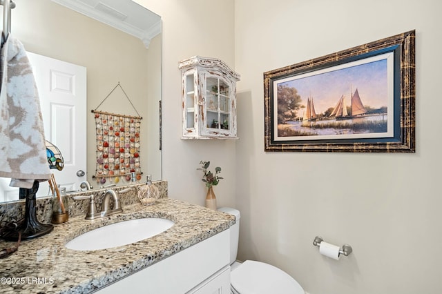 bathroom with crown molding, curtained shower, visible vents, toilet, and vanity