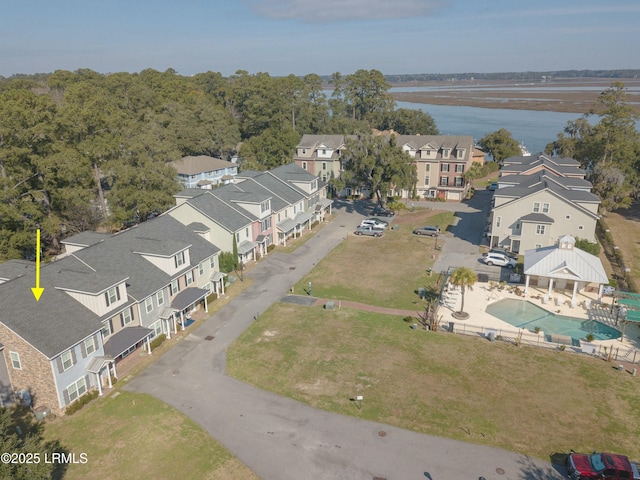 bird's eye view with a water view and a residential view