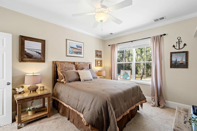 bedroom featuring ceiling fan, light carpet, visible vents, baseboards, and ornamental molding