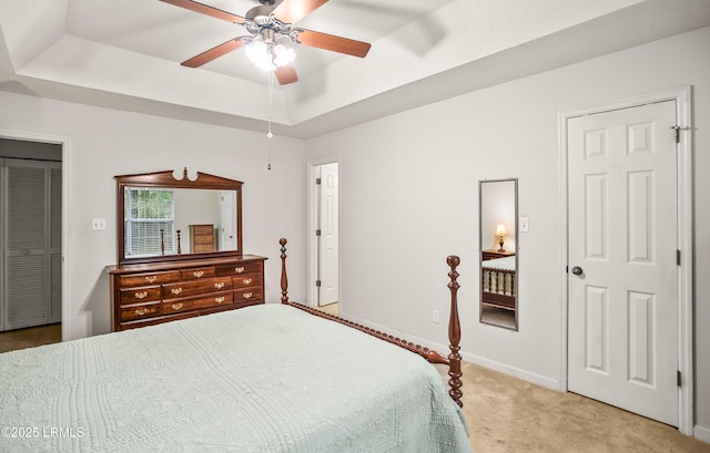 28 Walnut Hill St, Beaufort, SC 29907 - bedroom featuring a raised ceiling, light carpet, baseboards, and ceiling fan