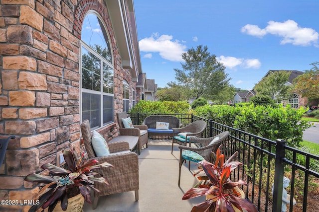 balcony featuring an outdoor hangout area