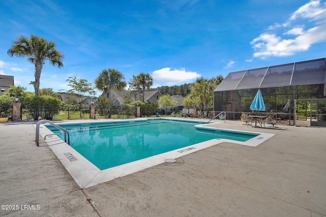 view of pool featuring a lanai and a patio area