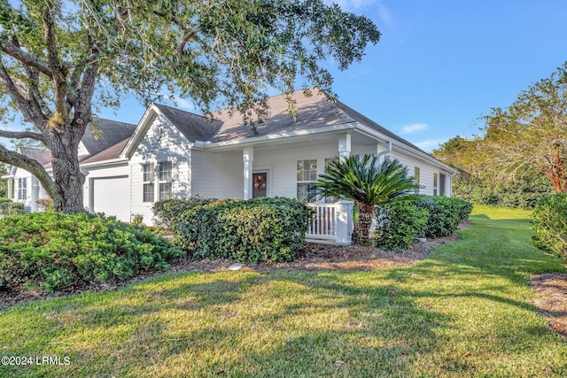 view of side of property with a lawn