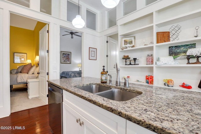 10 Abbey Row Unit 1A, Beaufort, SC 29906 - kitchen with a sink, stainless steel dishwasher, dark wood-style floors, white cabinetry, and ceiling fan