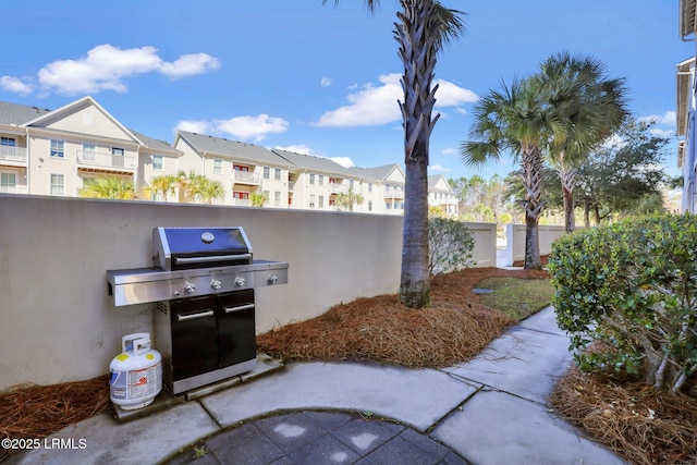 10 Abbey Row Unit 1A, Beaufort, SC 29906 - view of patio featuring a balcony, a residential view, and a grill