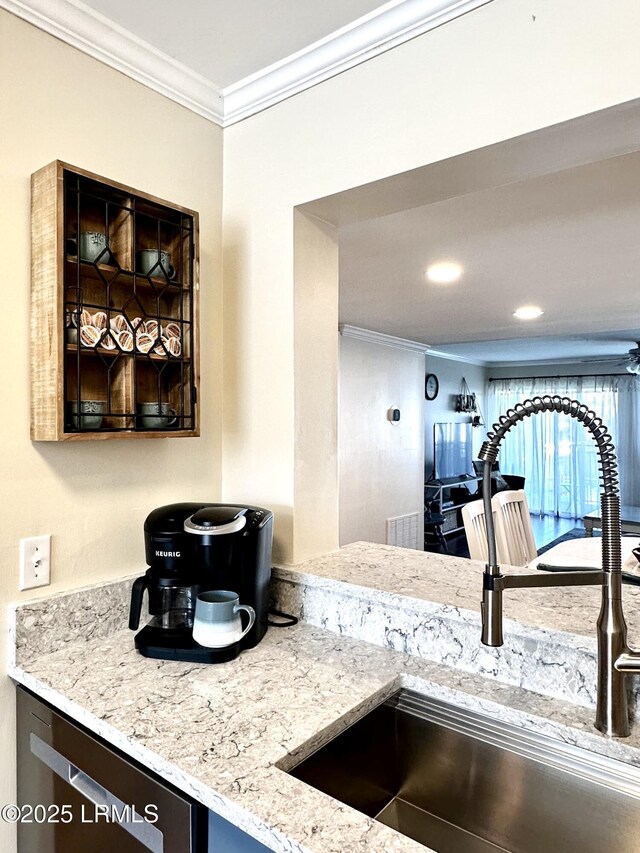 hallway featuring crown molding, dark hardwood / wood-style floors, and washer and dryer