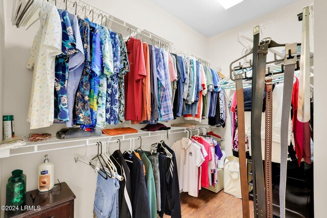 walk in closet featuring hardwood / wood-style floors