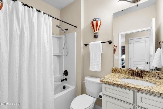 full bathroom featuring vanity, toilet, and shower / tub combo with curtain