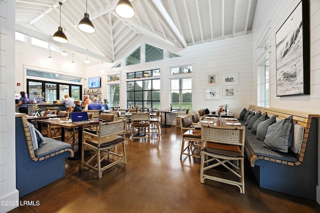 510 Dogwood Ln, Hardeeville, SC 29927 - living room featuring high vaulted ceiling, concrete flooring, and beamed ceiling