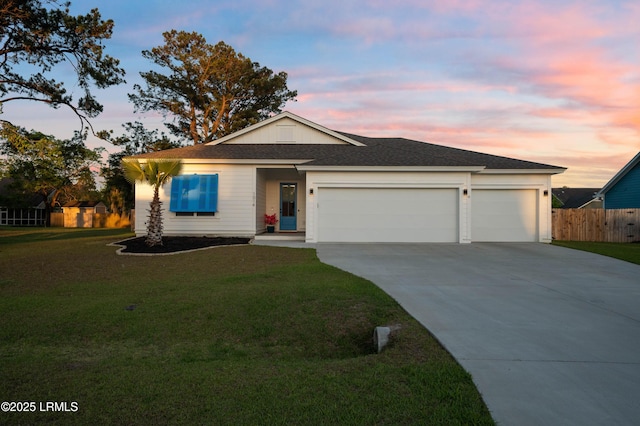 single story home featuring driveway, roof with shingles, an attached garage, fence, and a front lawn
