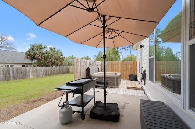 view of patio featuring a deck, a fenced backyard, and central air condition unit