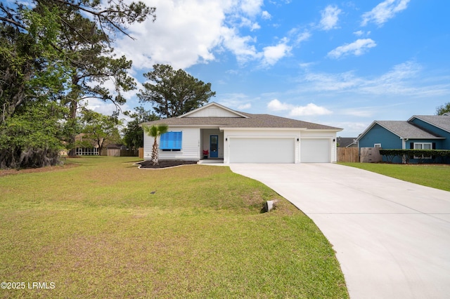 ranch-style home with a garage, fence, driveway, and a front yard