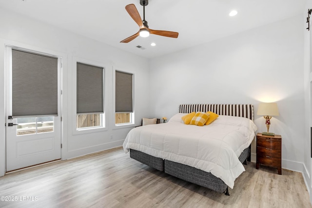 bedroom featuring recessed lighting, ceiling fan, visible vents, light wood-style flooring, and baseboards