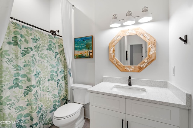 full bath with toilet and vanity