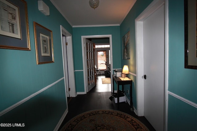 corridor featuring crown molding and dark hardwood / wood-style floors