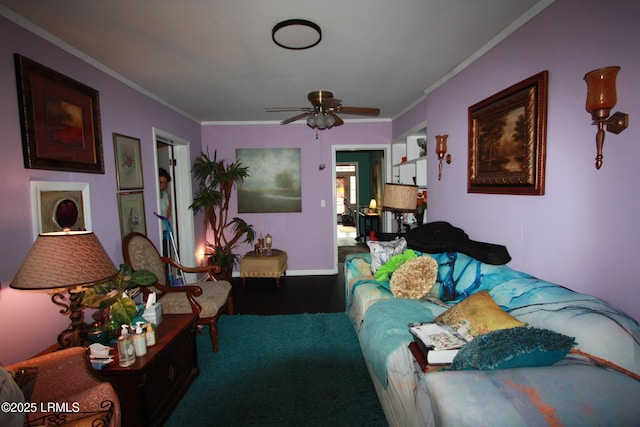 living room featuring crown molding, carpet floors, and ceiling fan