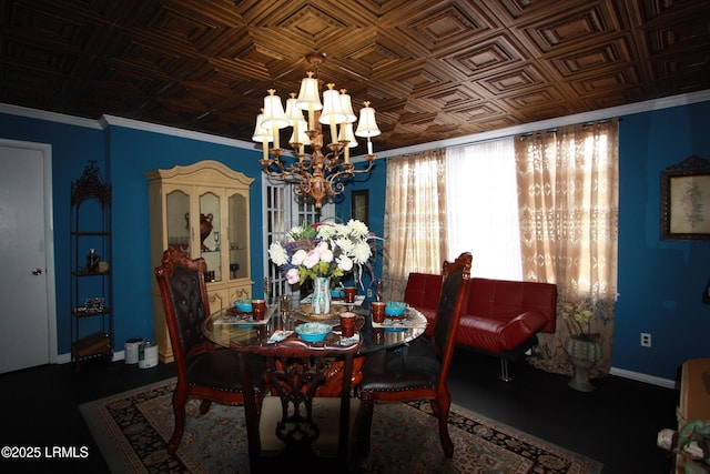 dining space featuring ornamental molding and a chandelier