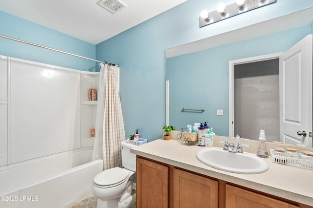 full bathroom with vanity, toilet, and shower / bath combo with shower curtain