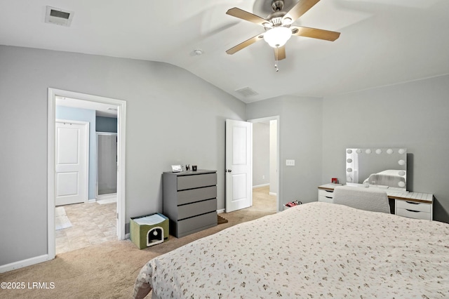 carpeted bedroom with lofted ceiling and ceiling fan