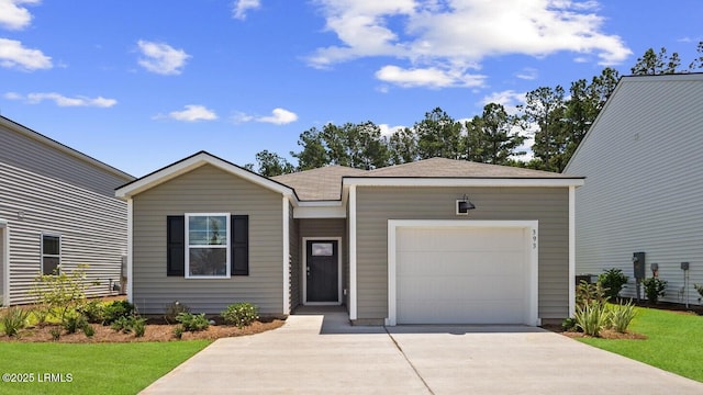 1627 Sanctum St, Ridgeland, SC 29936 - view of front of property featuring driveway, an attached garage, and a front lawn