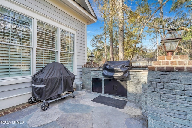 view of patio / terrace featuring a grill