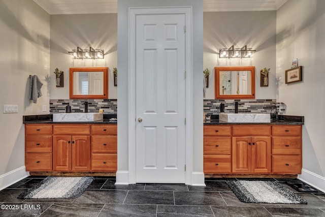 bathroom with ornamental molding, vanity, and backsplash