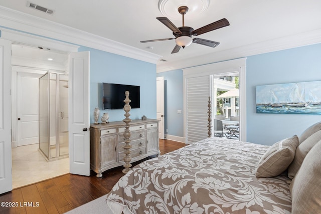 bedroom featuring ornamental molding, ceiling fan, and dark hardwood / wood-style flooring