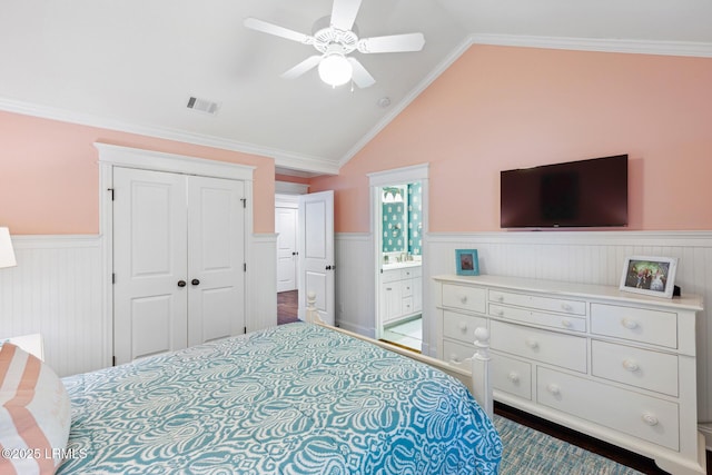 bedroom with lofted ceiling, dark wood-type flooring, a closet, and ceiling fan