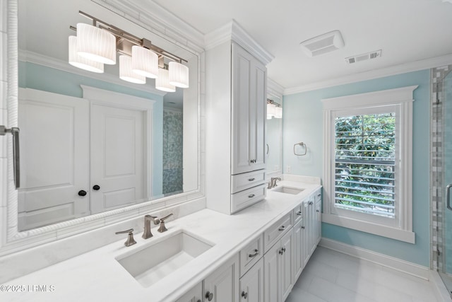 bathroom with an enclosed shower, vanity, and ornamental molding