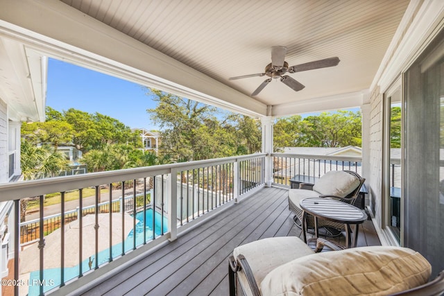 wooden deck with ceiling fan