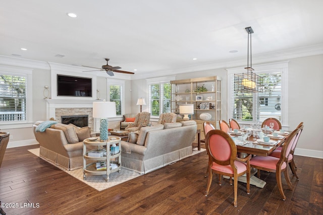 living room featuring crown molding, ceiling fan, and dark hardwood / wood-style floors