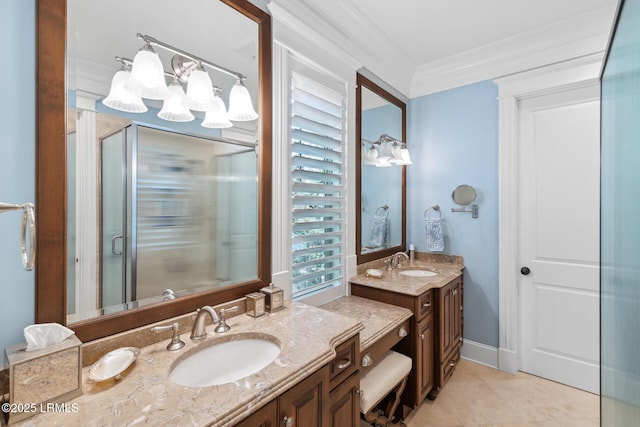 bathroom with vanity, tile patterned flooring, crown molding, and walk in shower