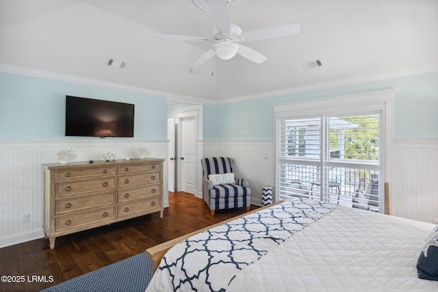 bedroom with crown molding, dark wood-type flooring, and ceiling fan