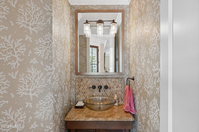 bathroom featuring tasteful backsplash and vanity